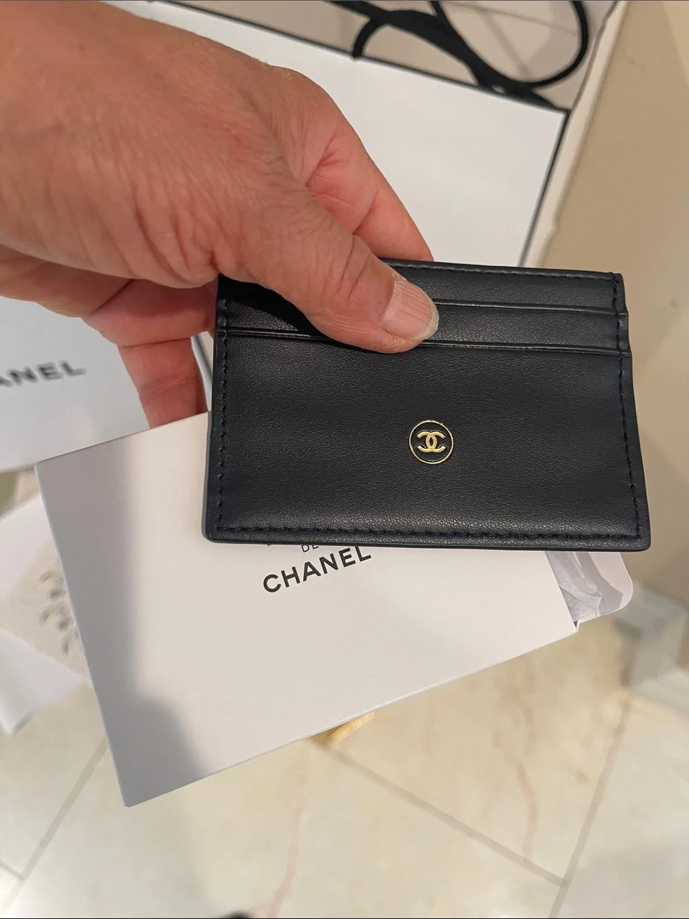 CHANEL Men’s White Gift Packaging with Leather Black Card Holder